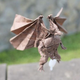 Illustration for article titled Papercraft Genius Creates Origami Dragons, Grim Reaper, and More